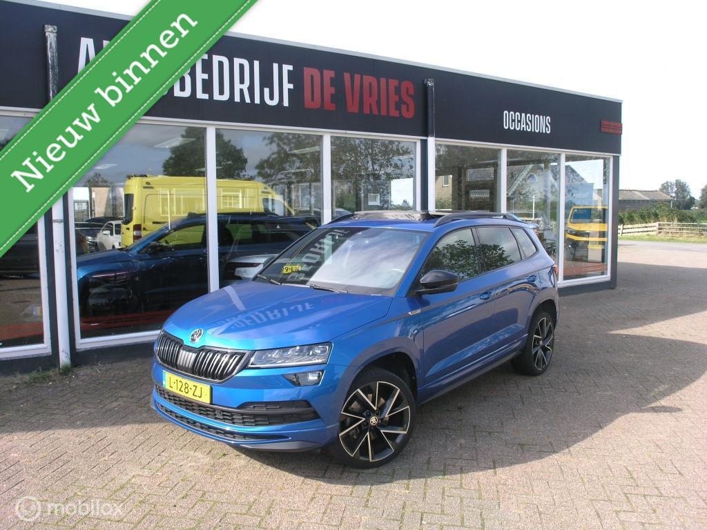 Skoda Karoq 1.5 TSI ACT Sportline Pano/ACC/Virtual/Newmodel, 4 cilinders, Blauw, Bedrijf, Automatische klimaatregeling