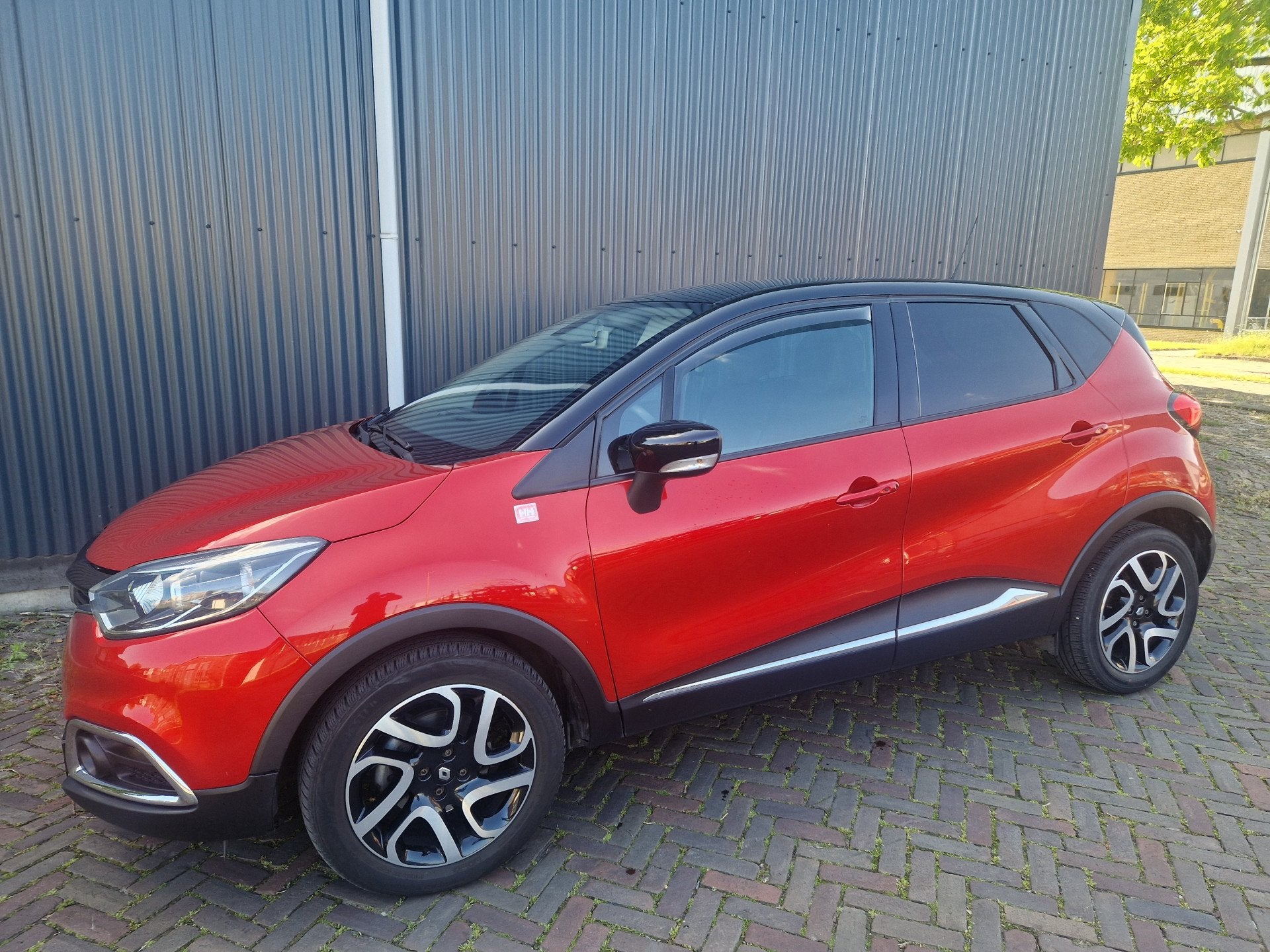 Renault Captur 1.2 TCe Helly Hansen Automaat, Climatronic,PD, Auto's, Euro 5, 4 cilinders, Leder en Stof, SUV of Terreinwagen