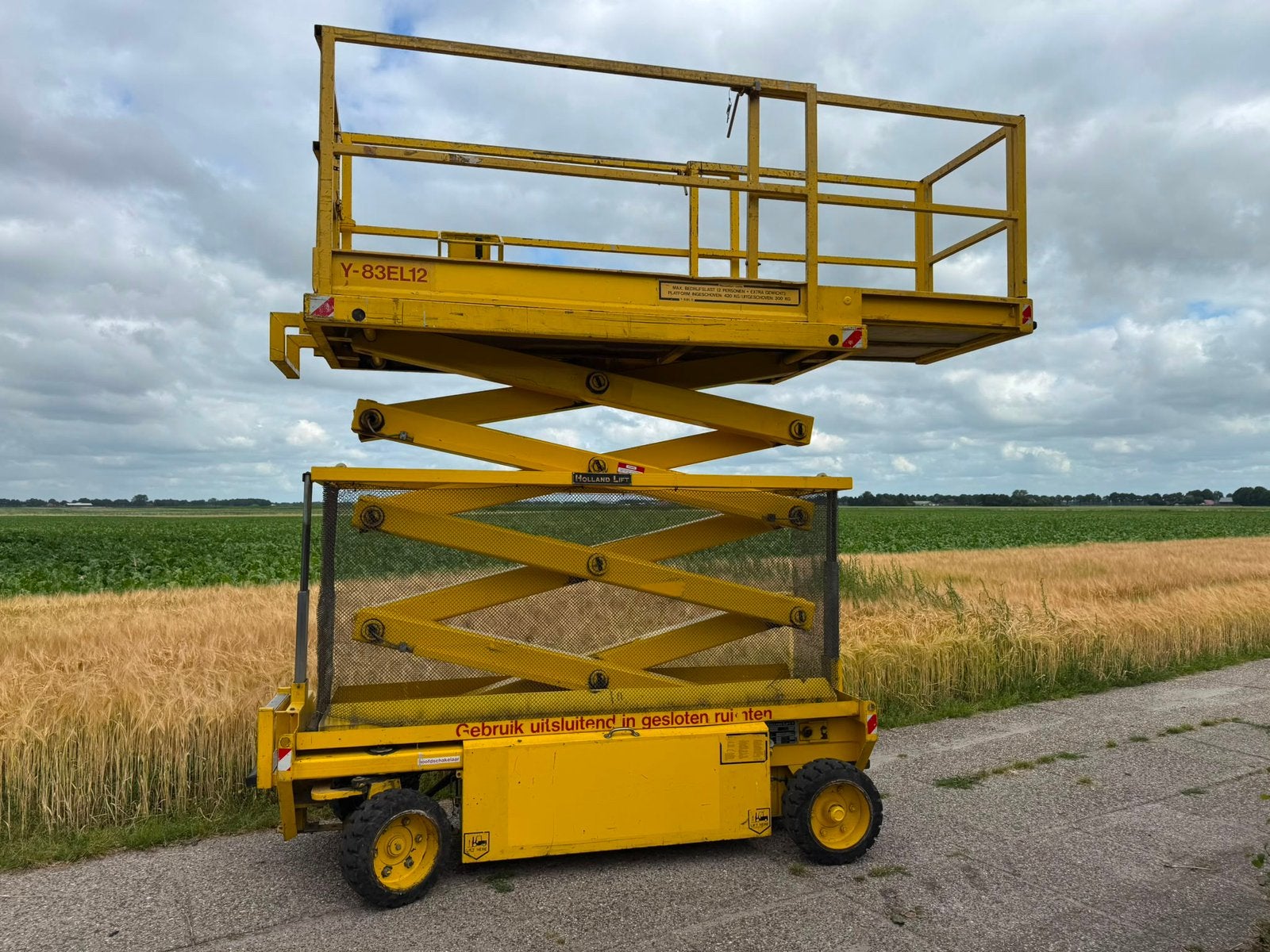 Holland lift Y83EL12 Monostar schaarhoogwerker hoogwerker, Ophalen