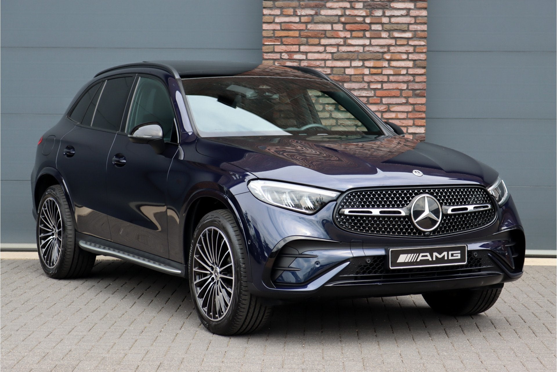 Mercedes-Benz GLC 400e 4MATIC AMG Line Aut9 | Distronic Pro, Auto's, Gebruikt, 4 cilinders, Blauw, Vierwielaandrijving