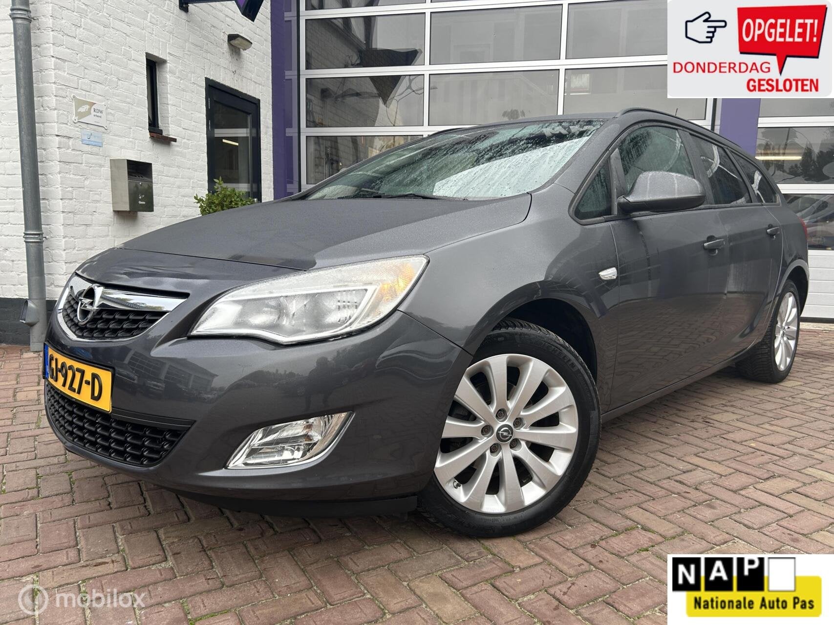 Opel Astra Sports Tourer 1.4 Turbo Cosmo * AUTOMAAT * AIRCO, Auto's, Euro 5, Gebruikt, 4 cilinders, 1403 kg