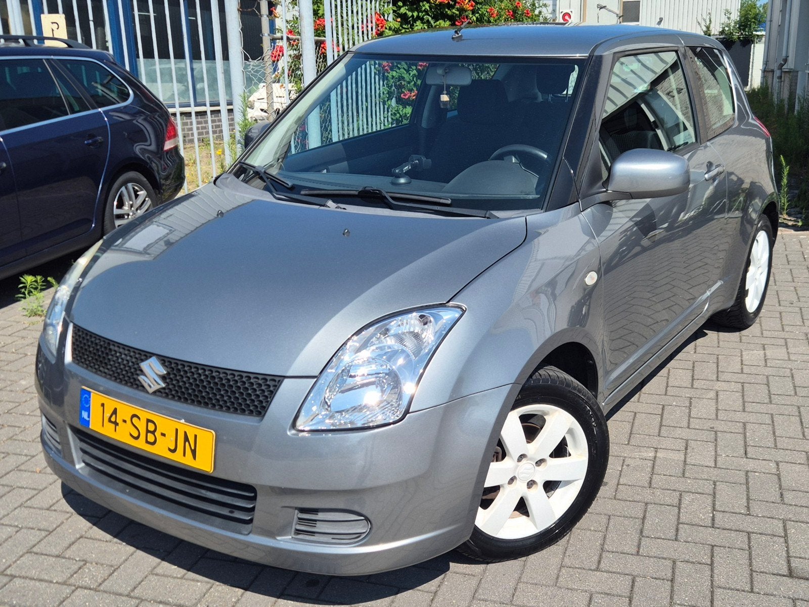 Suzuki Swift 1.3 3D 2005 Grijs*Witte velgen*, Auto's, 31 €/maand, Swift, Origineel Nederlands, Bedrijf