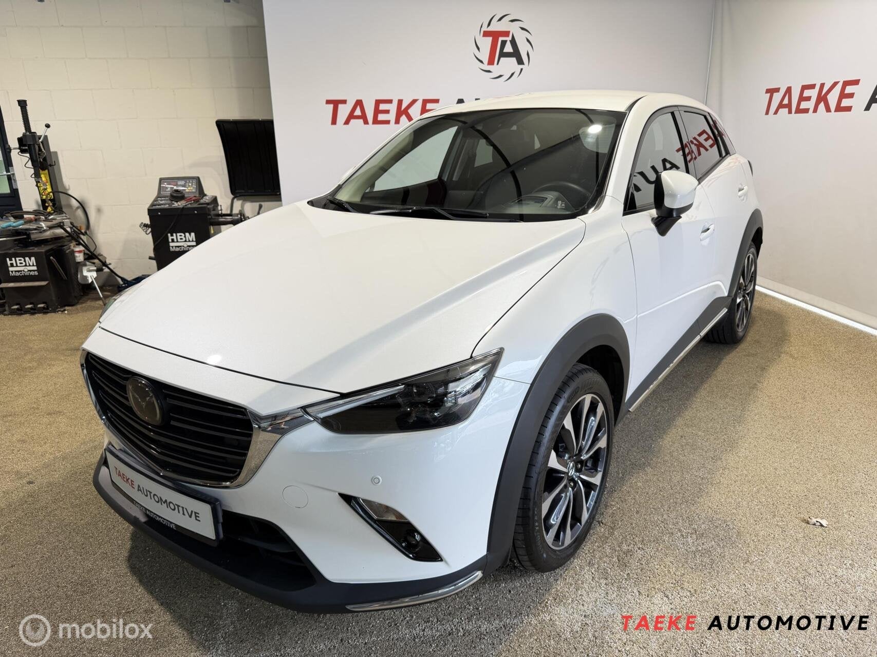 Mazda CX-3 2.0L SKYACTIV-G AUT/CLIMA/CRUISE/BOSE/HUD/APK, Auto's, Gebruikt, 4 cilinders, 625 kg, Leder en Stof