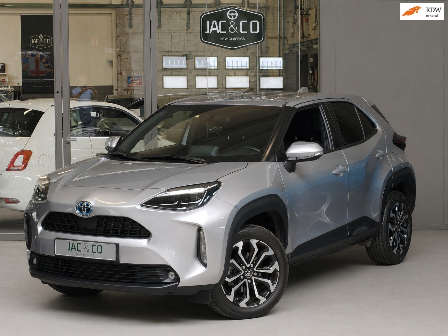 Toyota Yaris Cross 1.5 Hybrid First Edition Full map Navi -, Stof, Bedrijf, 115 pk, Hybride Elektrisch/Benzine