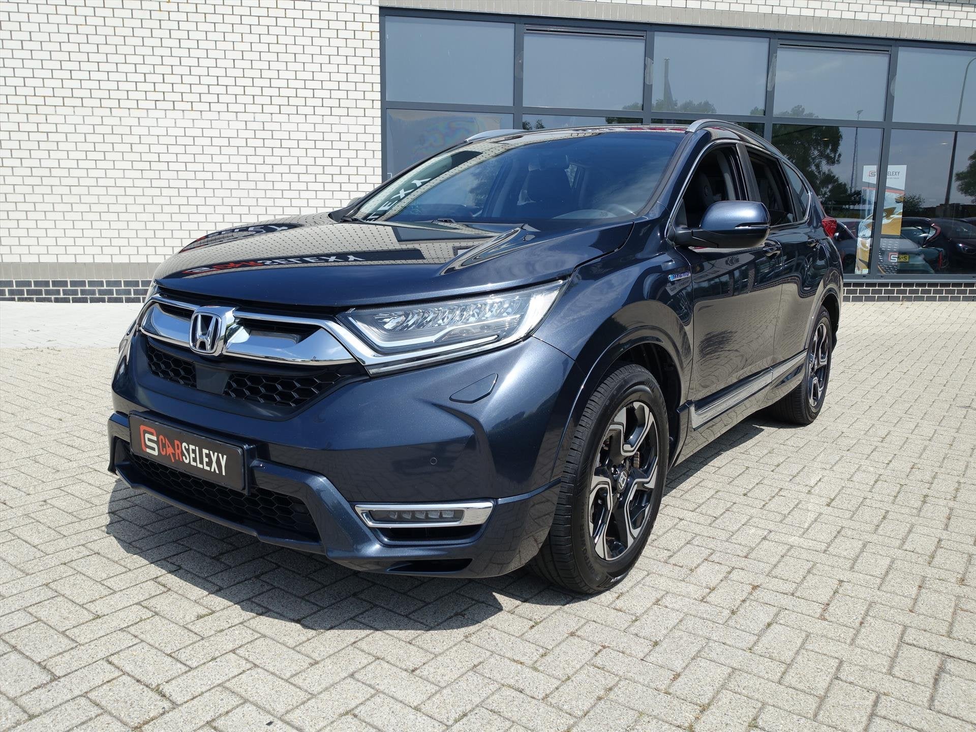 HONDA CR-V 2.0 Hybride 184pk 2WD E-CVT Lifestyle, Auto's, Automaat, Gebruikt, Blauw, Leder