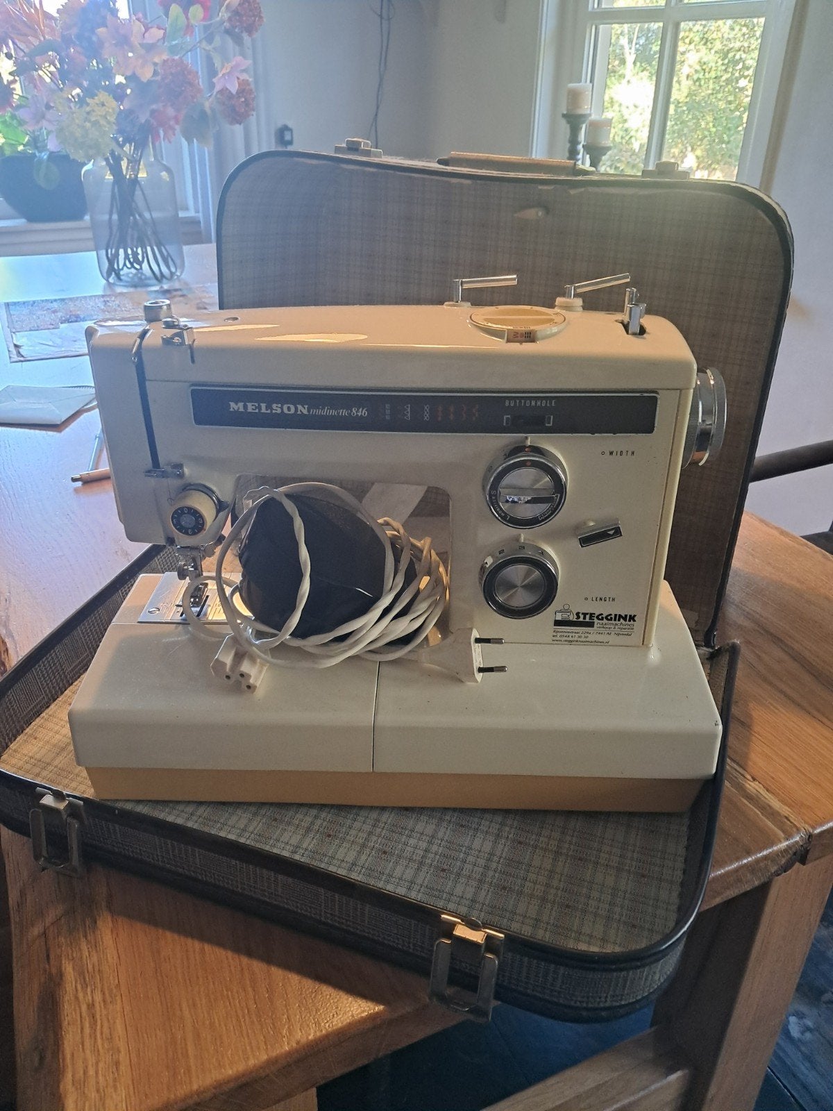 Goede naaimachine, Ophalen