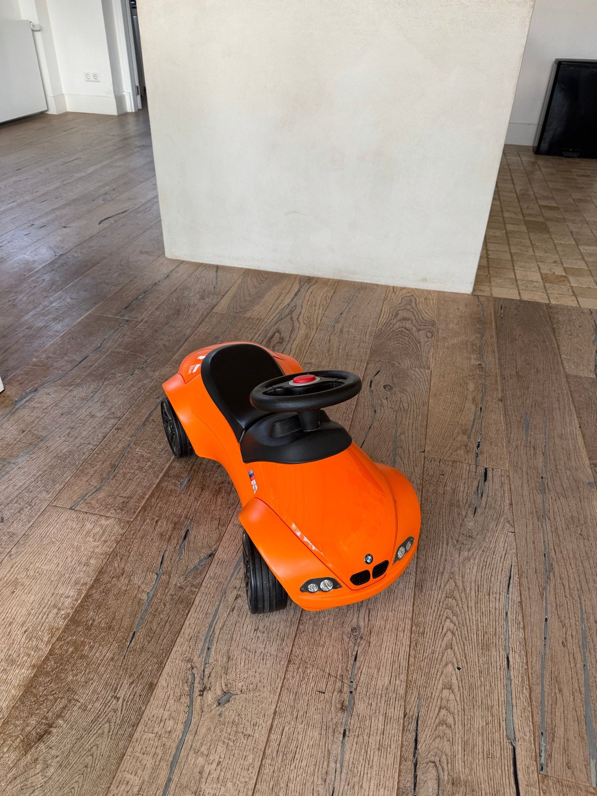 Oranje BMW Baby Racer loopauto voor kinderen, Ophalen, Zo goed als nieuw