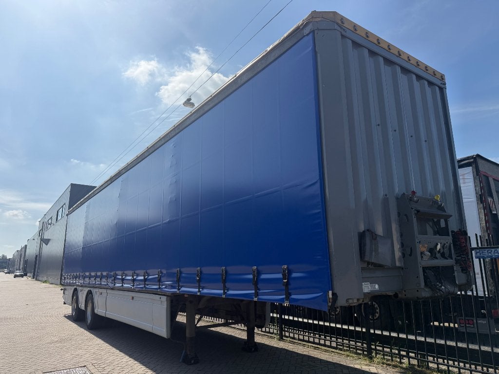 KRONE TRIDEC GESTUURDE 2 ASSIGE OPLEGGER.!!, Auto's, Vrachtwagens, Bedrijf, Te koop, Euro 6