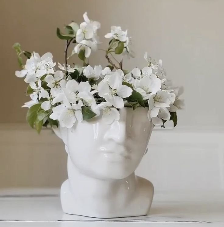 Witte vaas van H&M Home in de vorm van een hoofd, Huis en Inrichting, Woonaccessoires | Vazen, Ophalen, Wit, Aardewerk of Porselein