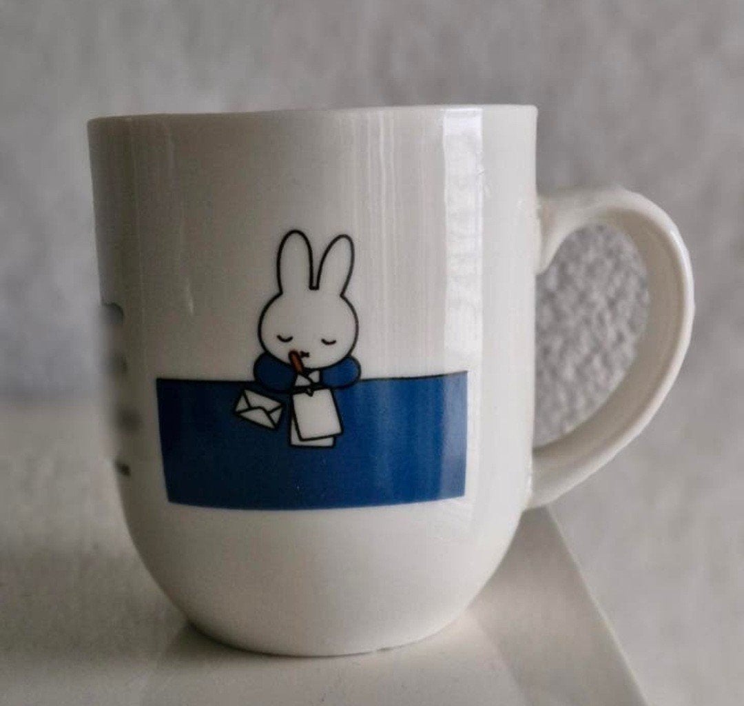 Douwe Egberts Beker met Nijntje opdrukken, Ophalen of Verzenden, Zo goed als nieuw, Overige stijlen, Kop(pen) en/of Schotel(s)