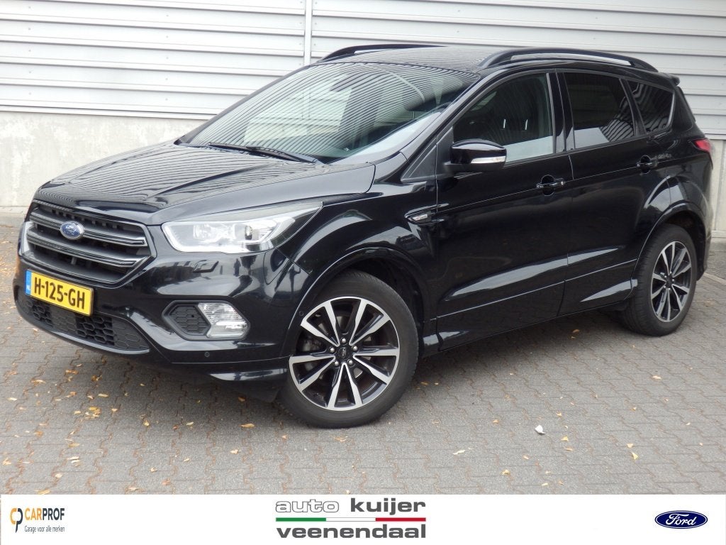 Ford Kuga 1.5 EcoB. ST Line I Trekhaak I (bj 2017), Auto's, Ford, 4 cilinders, Zwart, Origineel Nederlands, Bedrijf