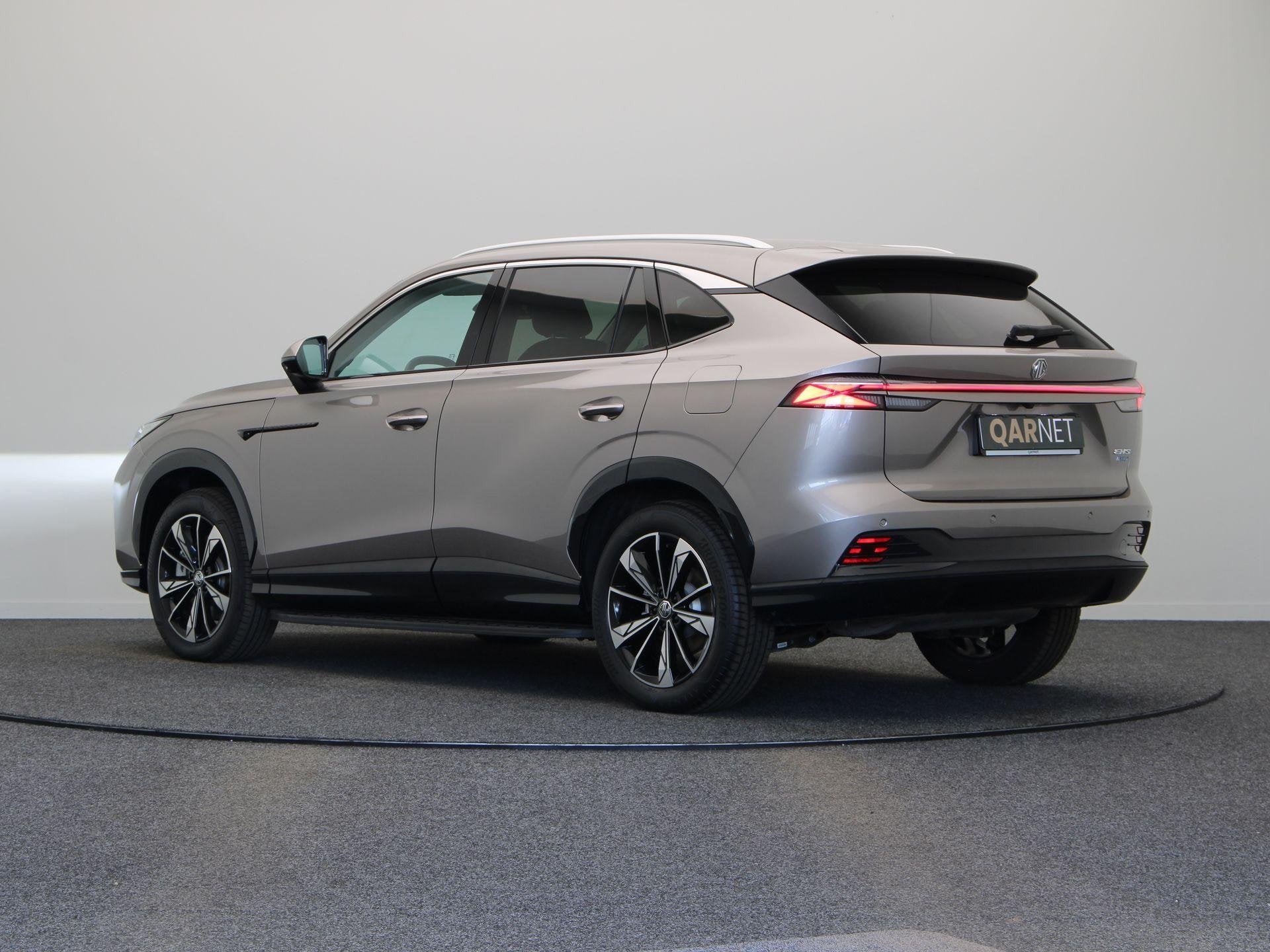 MG HS 1.5 Luxury | Elektrische Verstelbare Stoelen | Stoelve, Auto's, Stof, Gebruikt, 4 cilinders, 21 kWh