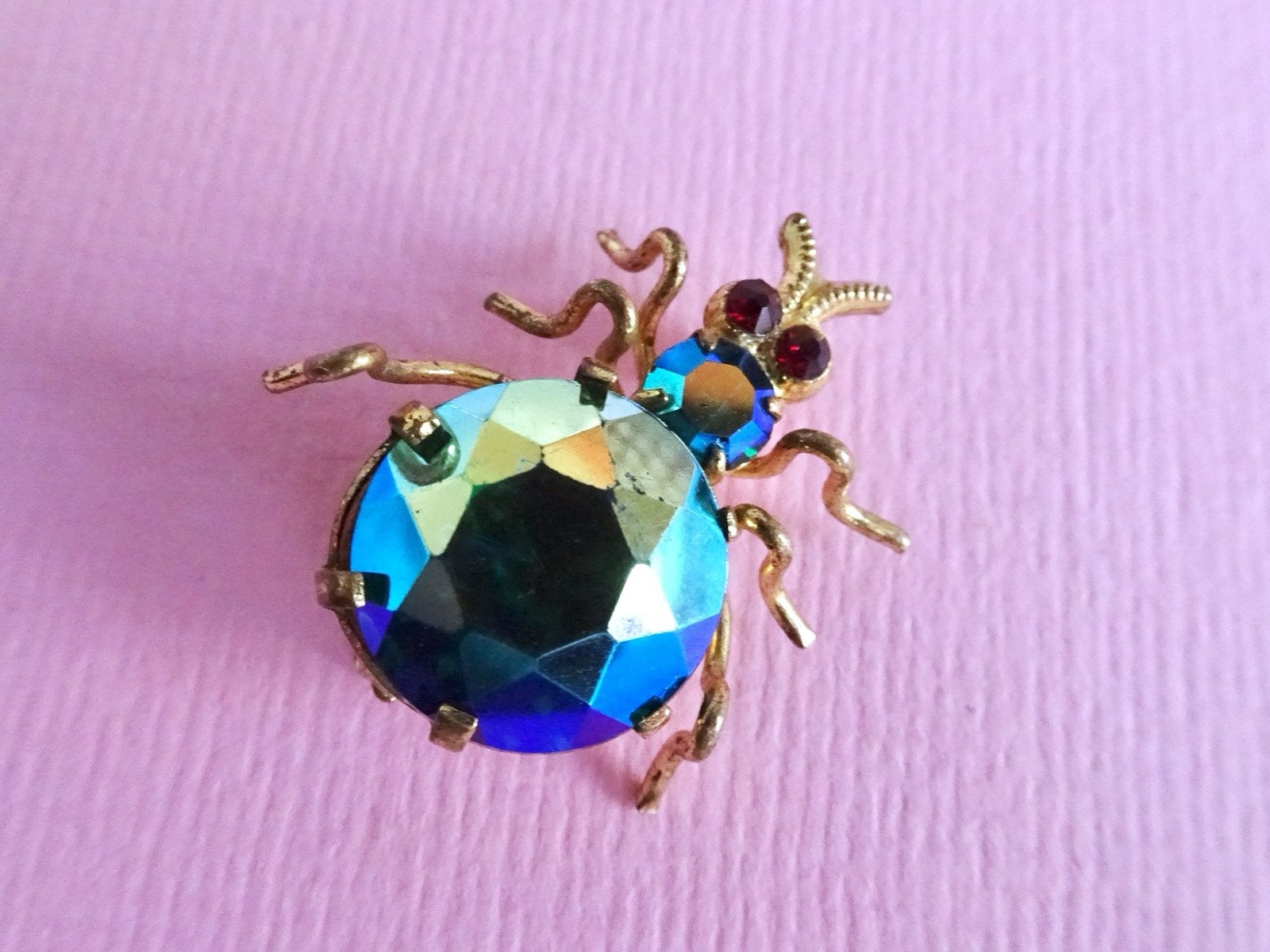 jwg Art Deco 30s aurora borealis spin insect broche gekleurd, Verzenden, Overige materialen, Broche