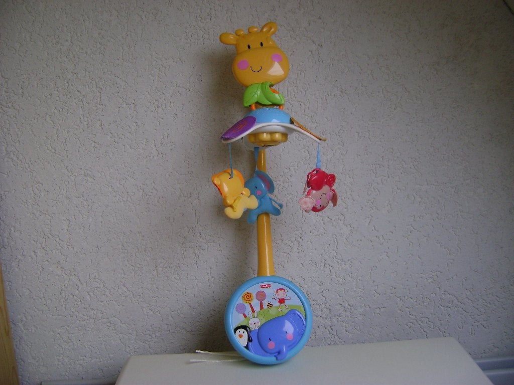 fischerprice mobiel met muziek achterkant wat verkleurd, Kinderen en Baby's, Speelgoed | Fisher-Price, Ophalen of Verzenden, Gebruikt