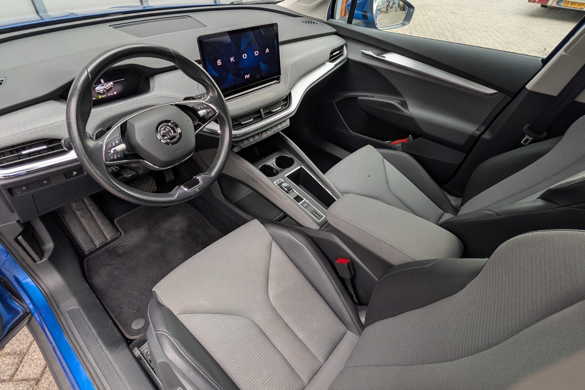 Skoda Enyaq iV 80 SOH 91% Trekhaak Warmtepomp (bj 2021), Auto's, Skoda, Automaat, Dealer onderhouden, Achterwielaandrijving, Gebruikt