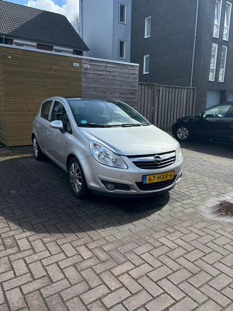 Opel Corsa 1.4 16V 5D 2009 Grijs, Auto's, Voorwielaandrijving, 1063 kg, 4 cilinders, 49 €/maand