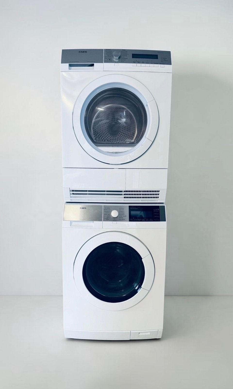 AEG Protex wasmachine 9 kg en Warmtepomp Condensdroger A+++, Ophalen, Anti-kreukfase, 8 tot 10 kg, Zo goed als nieuw