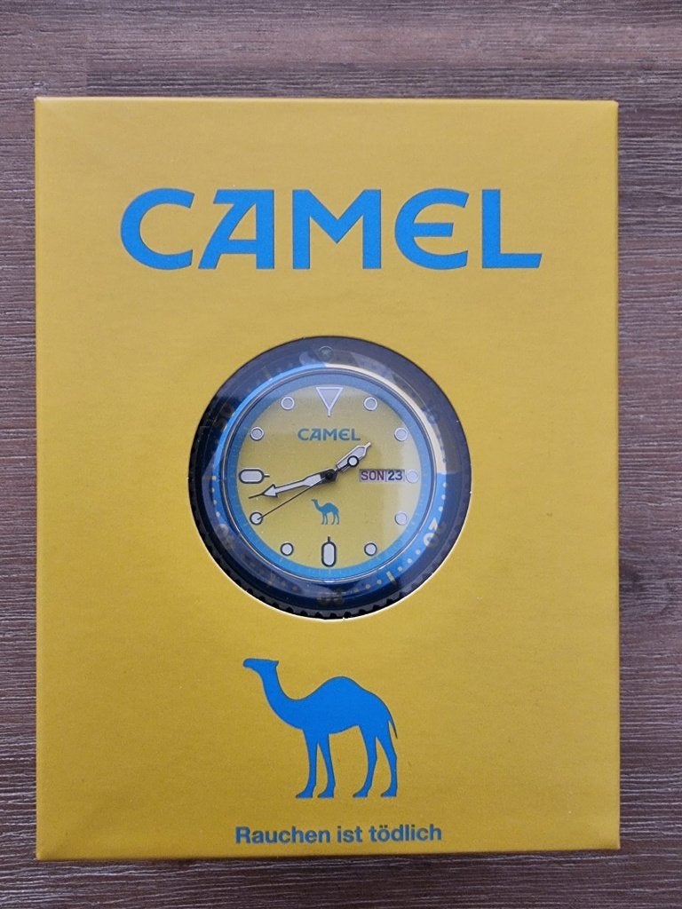 nieuw in doos camel horloge, collectors item + drinkbeker, Overige merken, Overige materialen, Polshorloge, Nieuw