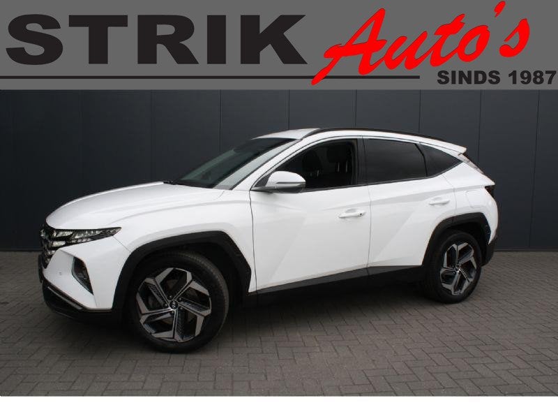 Hyundai Tucson 1.6 T-GDI HEV Comfort - NAVIGATIE, Auto's, Stof, Gebruikt, 4 cilinders, Automatische klimaatregeling