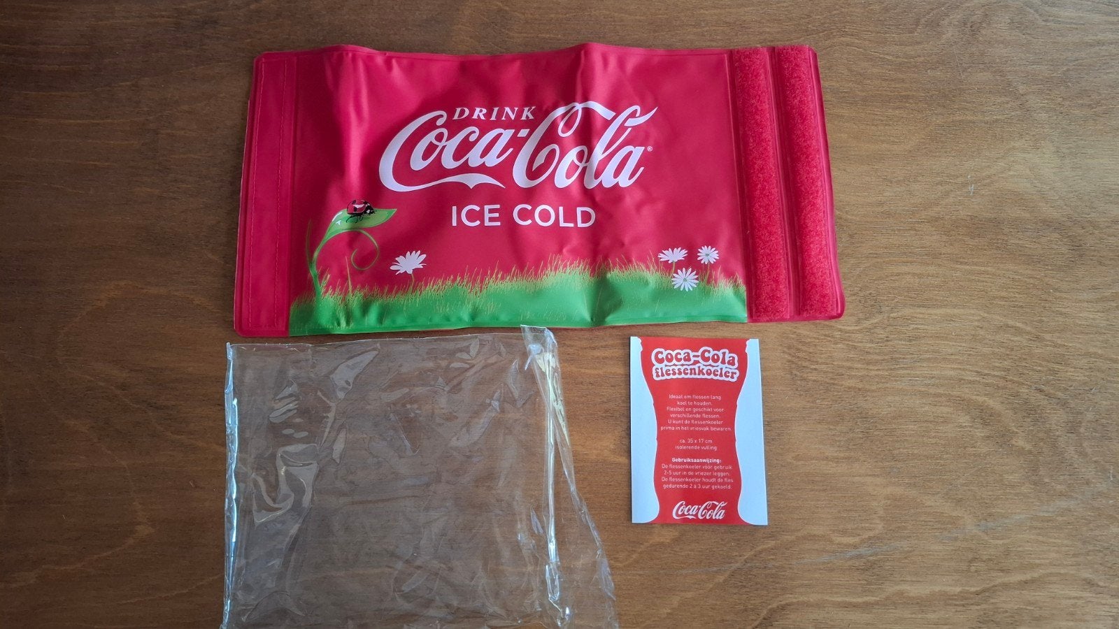 Coca Cola flessenkoeler hoes (nieuw), Ophalen of Verzenden, Nieuw, Gebruiksvoorwerp