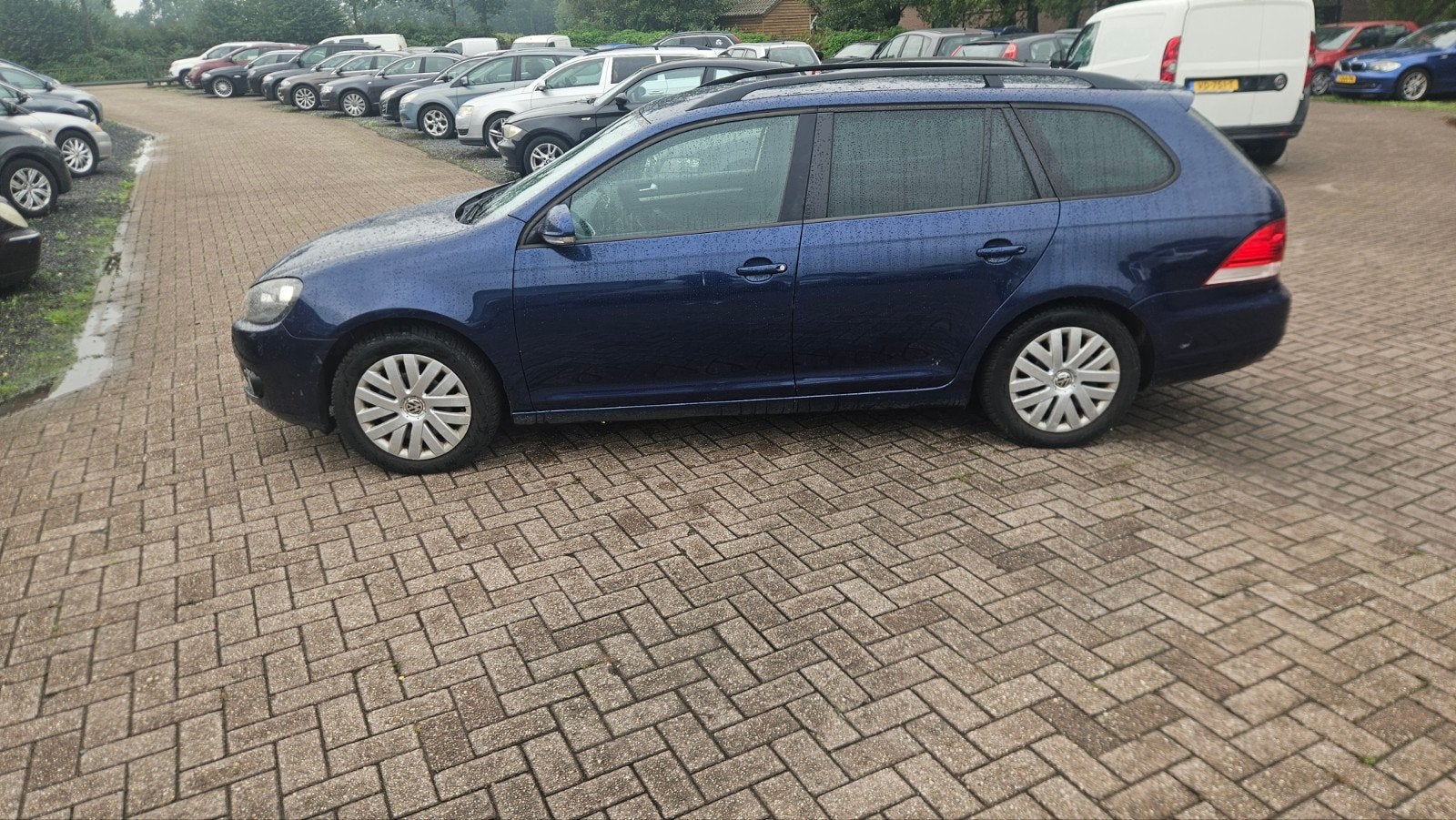 Volkswagen Golf 1.6 TDI 77KW Variant 2010 Blauw, Auto's, Voorwielaandrijving, Stof, Zwart, Blauw