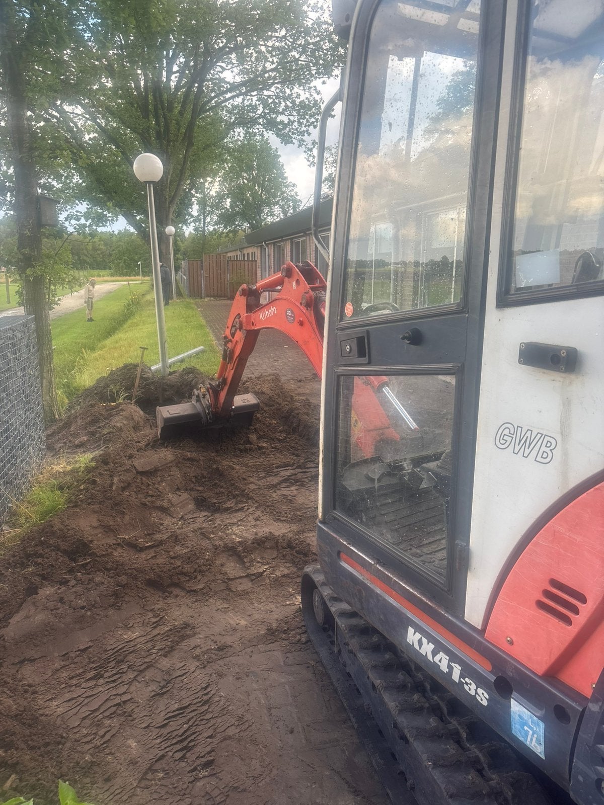 Minikraan minigraver te huur met machinist, Ophalen, Tuinaarde