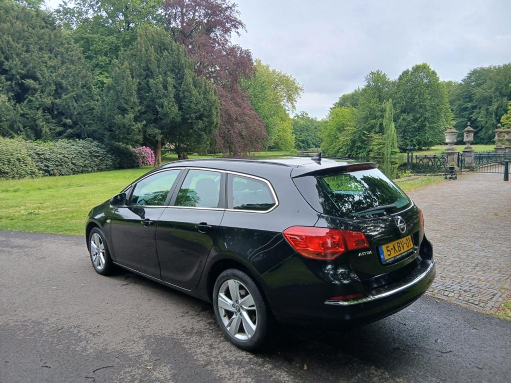 Opel Astra Sports Tourer 1.4 Turbo '13 Airco Navi Apk 7-2027, Auto's, Voorwielaandrijving, Stof, Zwart, 4 cilinders