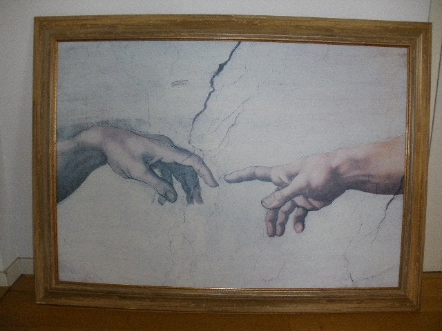 Schilderij in lijst van Michelangelo 'de hand van God', Ophalen