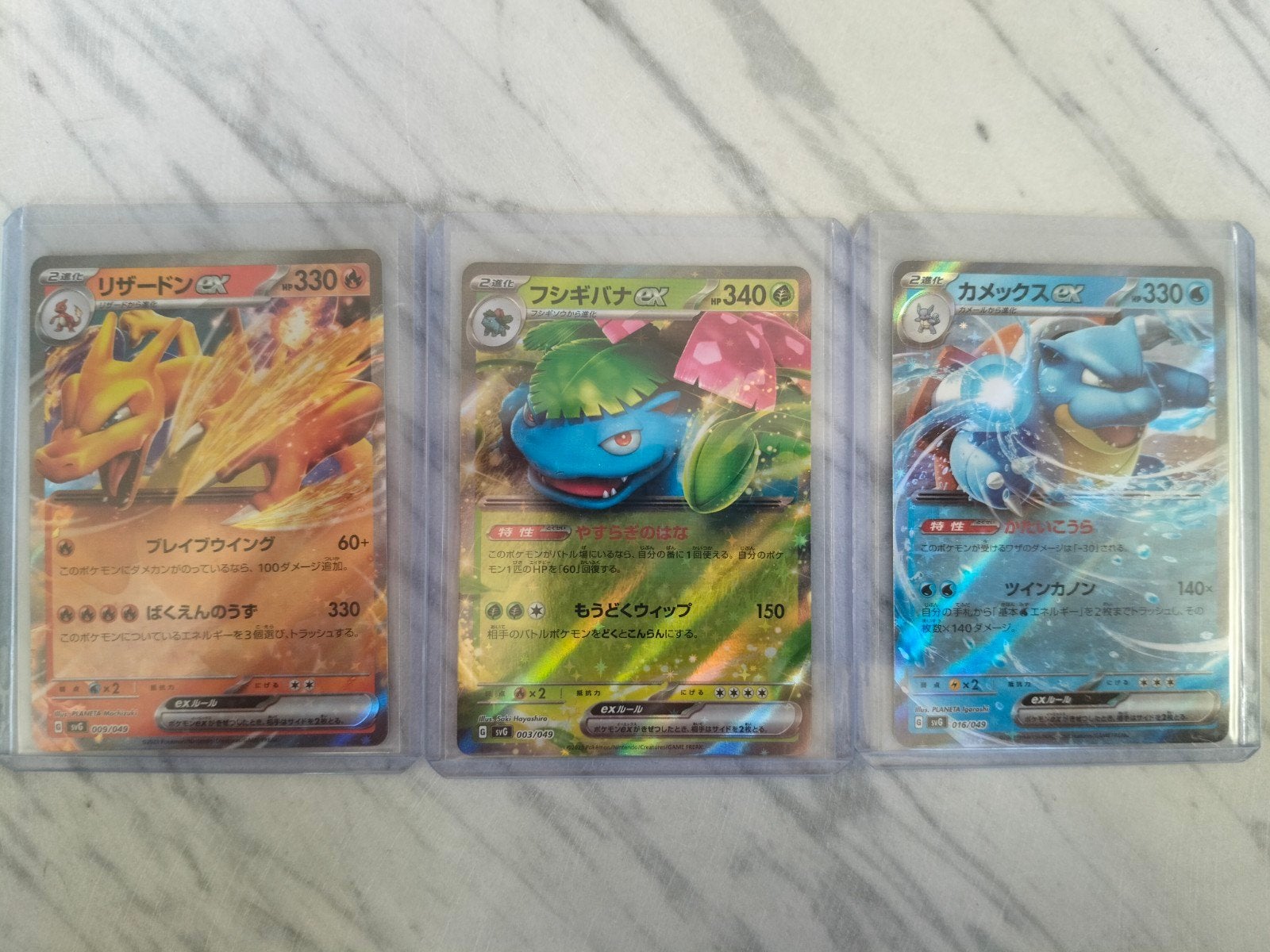 Charizard, Blastoise, Venusaur, Hobby en Vrije tijd, Ophalen of Verzenden, Zo goed als nieuw, Meerdere kaarten, Foil