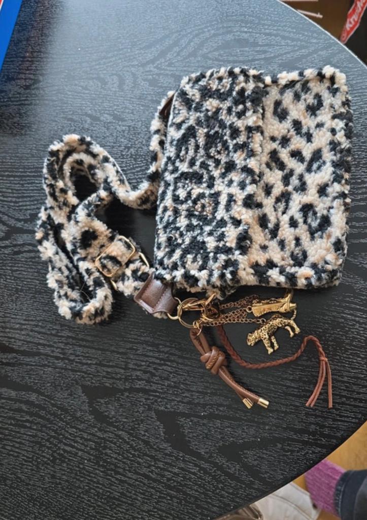Panter tasje, Ophalen, Nieuw