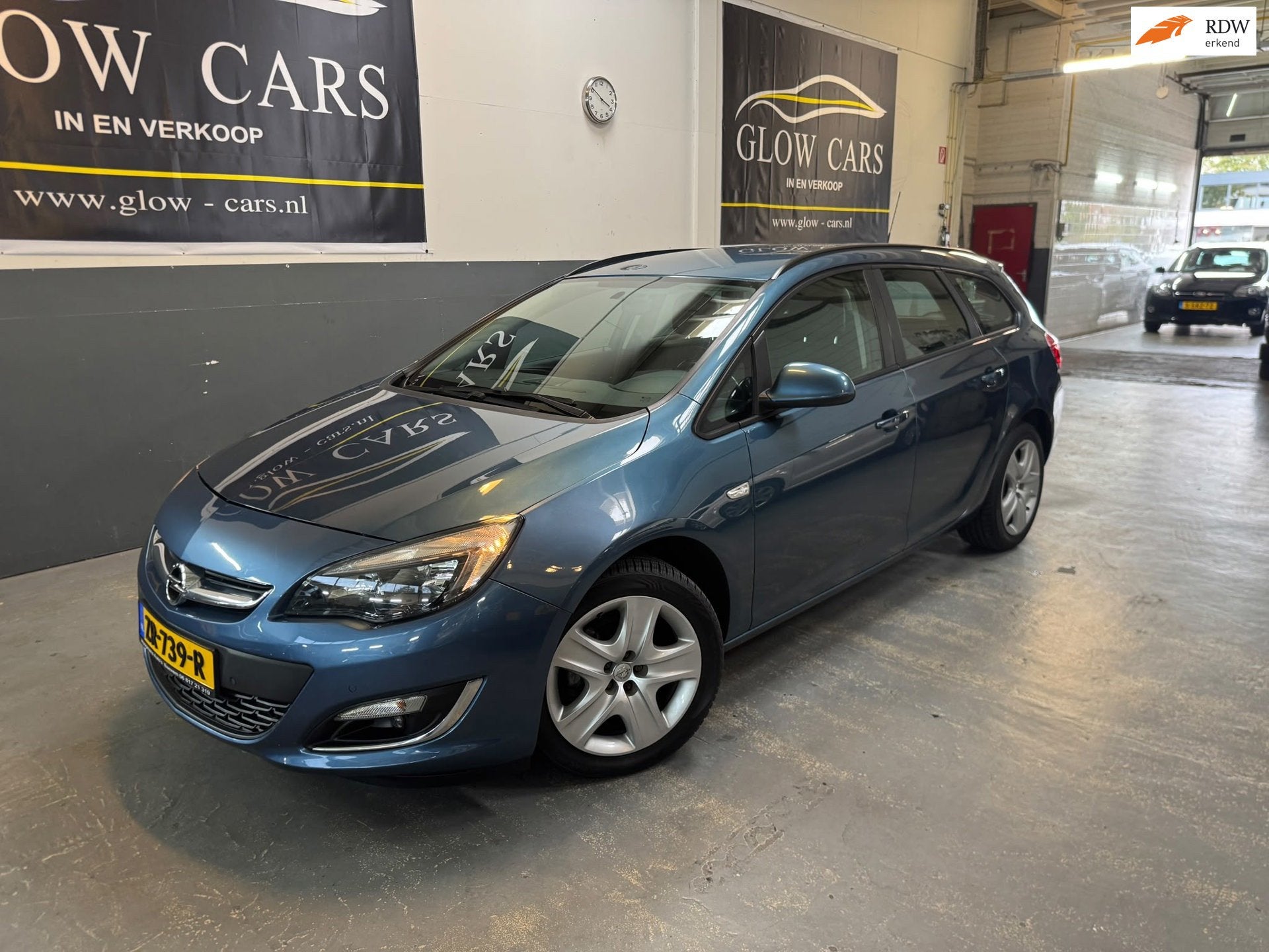 Opel Astra Sports Tourer 1.4 Turbo Design Edition |AIRCO|PDC, Auto's, Voorwielaandrijving, Gebruikt, Zwart, 4 cilinders
