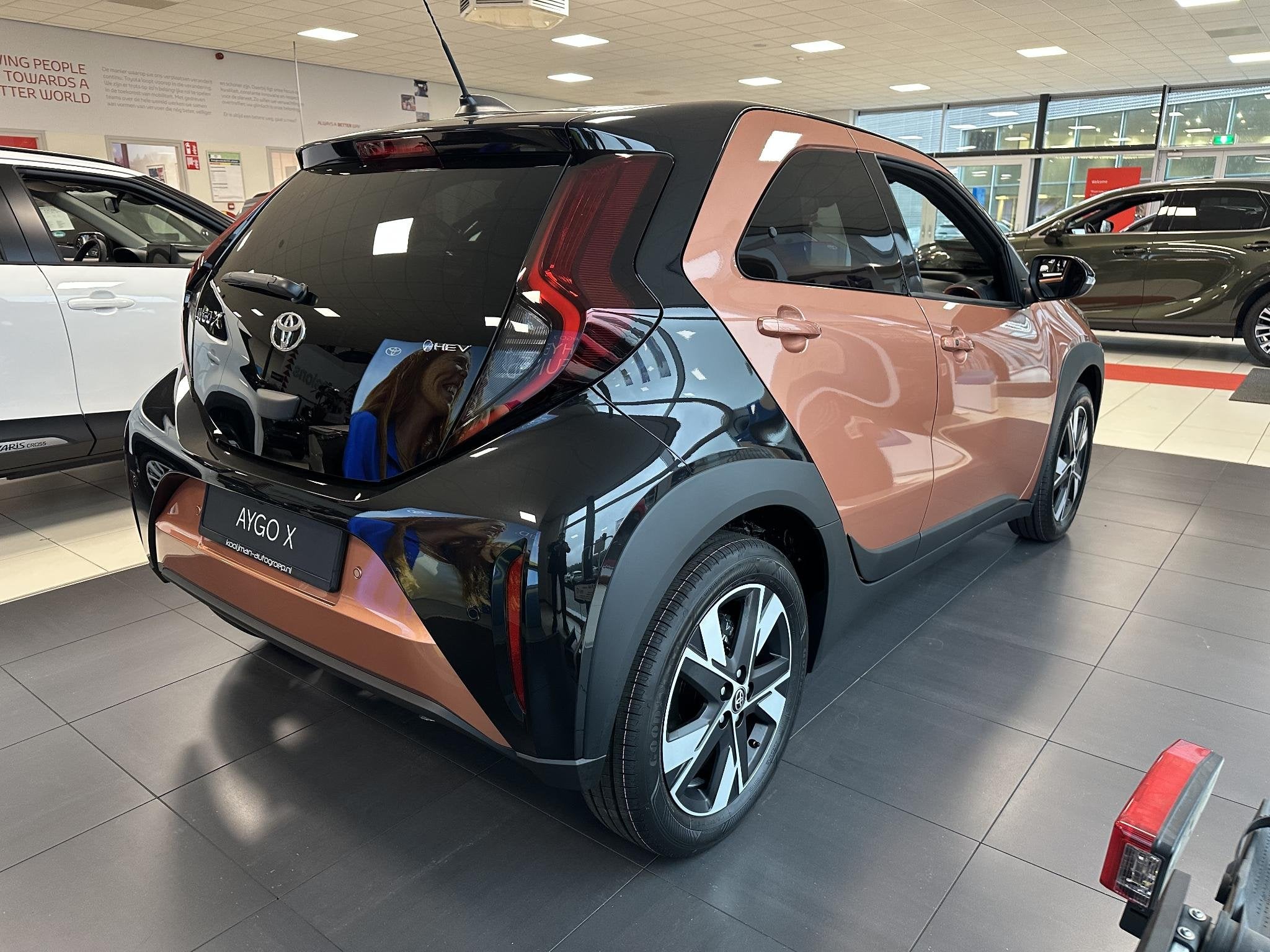 Toyota Aygo X Hybrid 115 pulse € 1500 inruilpremie, Snel l, Auto's, Dealer onderhouden, Stof, Gebruikt, Euro 6