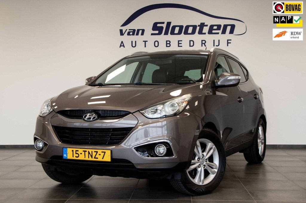 Hyundai Ix35 2.0i Business Edition | Automaat | Navigatie |, Auto's, Hyundai, Gebruikt, Zwart, 4 cilinders, Bruin