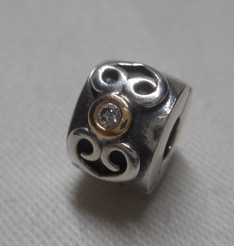 Zilveren Pandora Clip bedel met 14 kt goud en diamant nr.659, Verzenden, Pandora, Zo goed als nieuw, 1 bedel