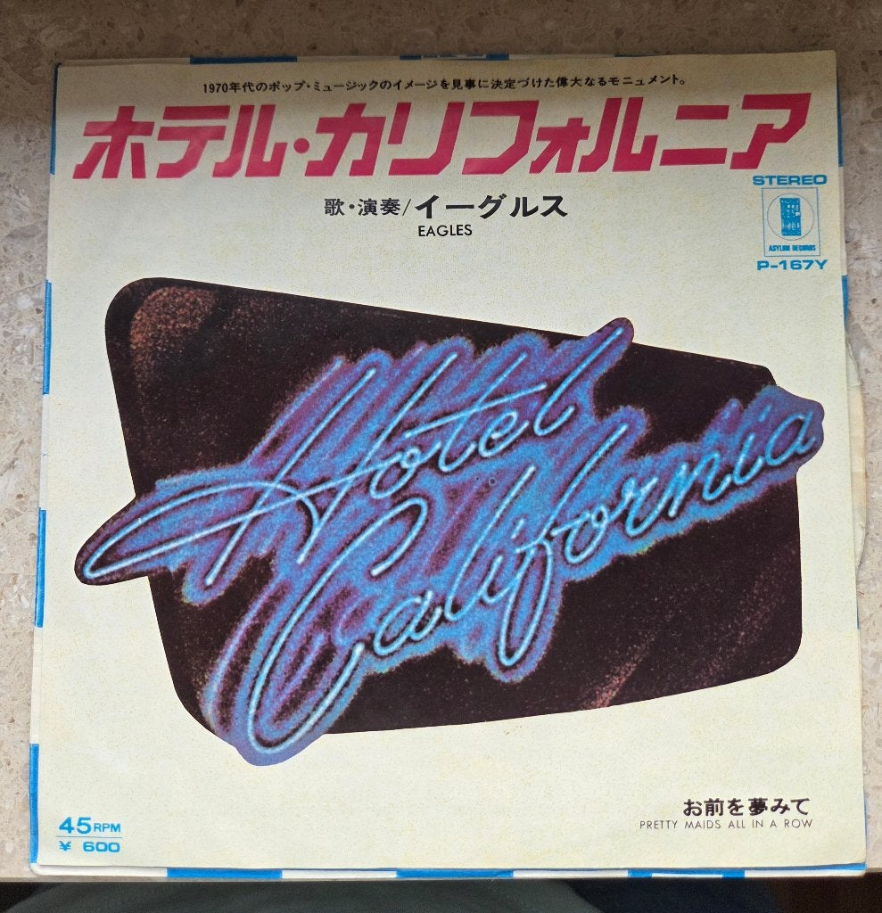 Eagles - Hotel California ( JAPAN ), 7 inch, Beschermende buitenhoes, Ophalen of Verzenden, Zo goed als nieuw