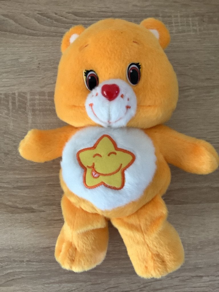 Care bears oranje troetelbeer ster op buik 2018  7,50 euro, Ophalen of Verzenden, Zo goed als nieuw, Overige typen