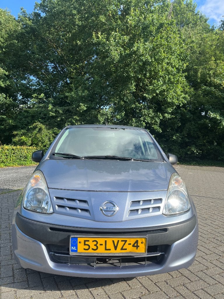 Nissan Pixo 1.0 68pk 5D 2010 Grijs, Auto's, Nissan, Voorwielaandrijving, Euro 5, Stof, 4 stoelen