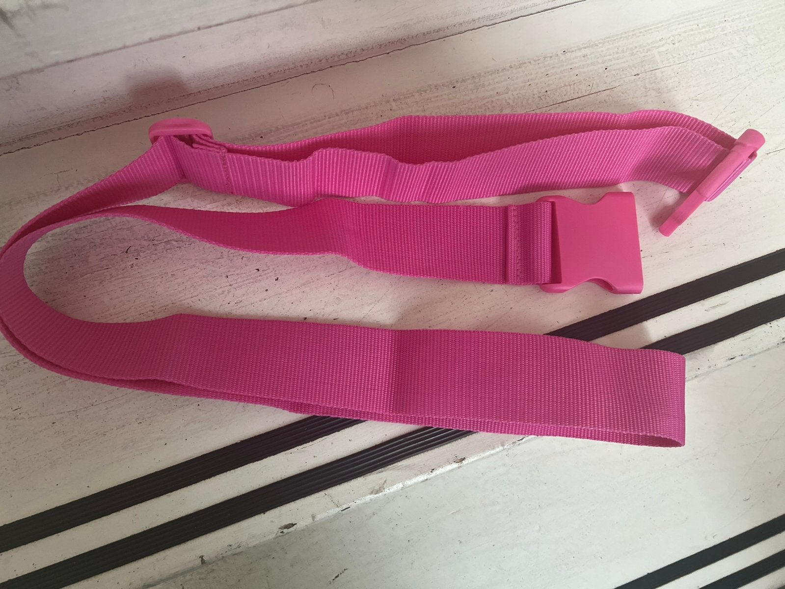 Roze koffer riem, Hard kunststof, Minder dan 50 cm, Ophalen of Verzenden, Zo goed als nieuw