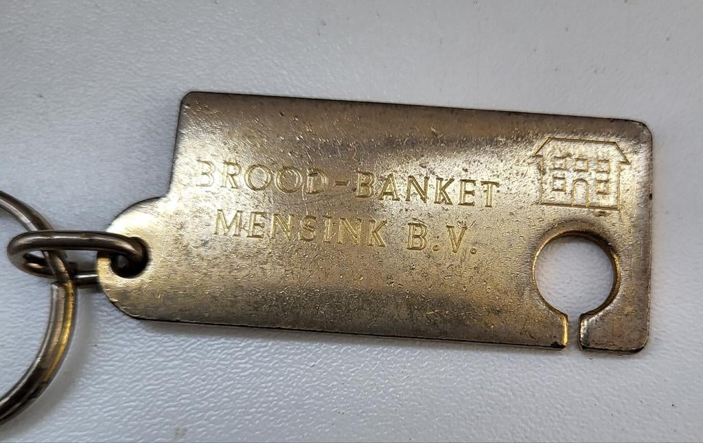 Vintage Sleutelhanger Brood-Banket Mensink B.V. met munt, Ophalen of Verzenden, Gebruikt, Overige typen