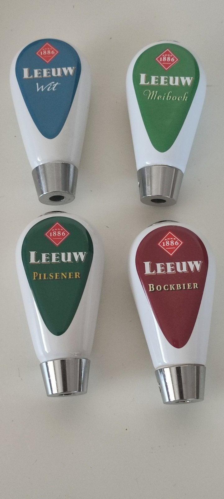 Leeuw bier tapknop taphendel ,4 verschillende, Verzamelen, Biermerken, Ophalen of Verzenden, Zo goed als nieuw, Leeuw