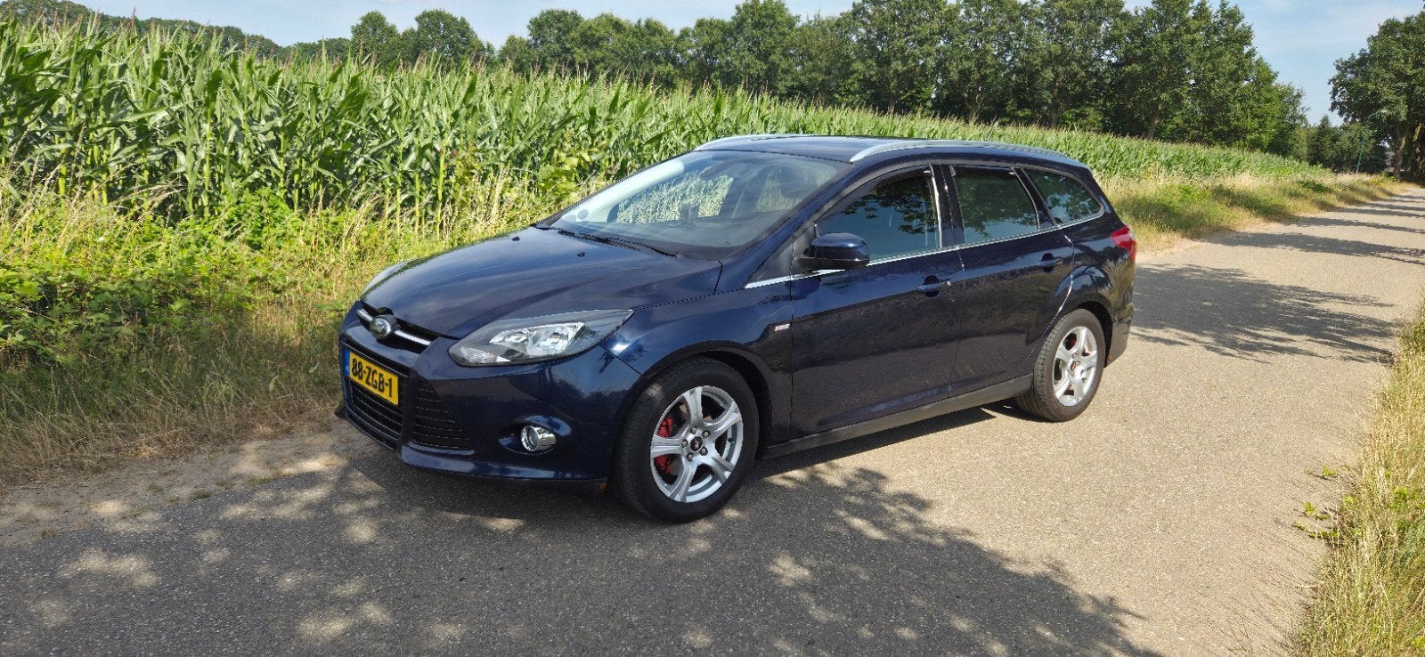 Ford Focus 1.0 Ecoboost 125PK TITANIUM blauw net&goed onderh, Auto's, 125 pk, Zwart, Blauw, Leder en Stof