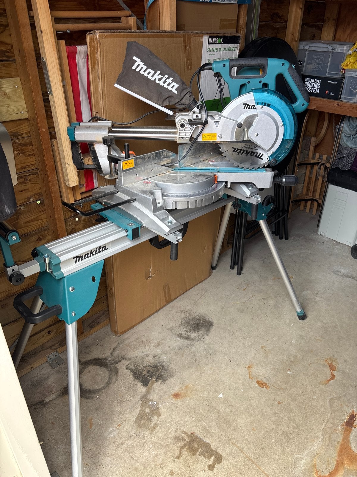 Makita LS1018LN Radiaal Afkortzaag met DEBWST06 Onderstel, Ophalen, 70 mm of meer, Zo goed als nieuw, Afkortzaag