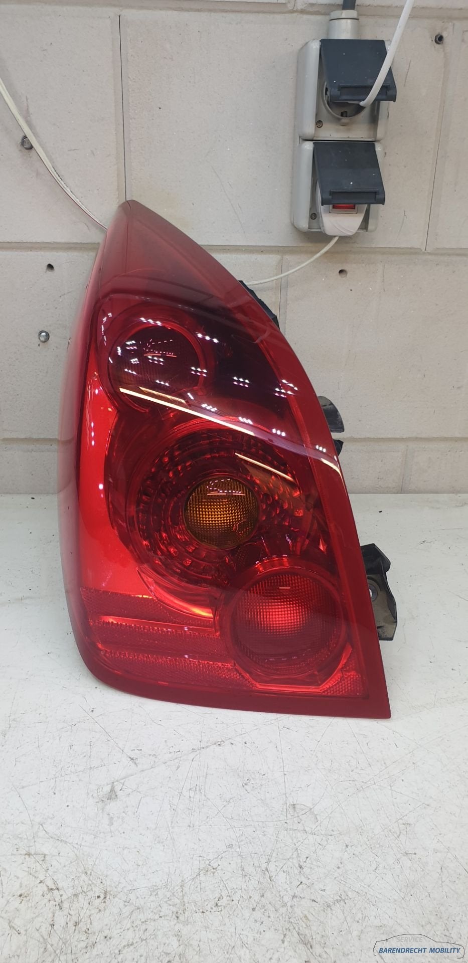 Achterlicht links Primera Nissan hatchback 26555AU210 bestuu