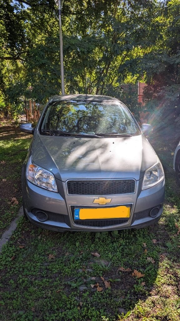 Chevrolet Aveo 1.2 16V 5D 2009 Grijs, Auto's, Voorwielaandrijving, Stof, 40 €/maand, 4 cilinders