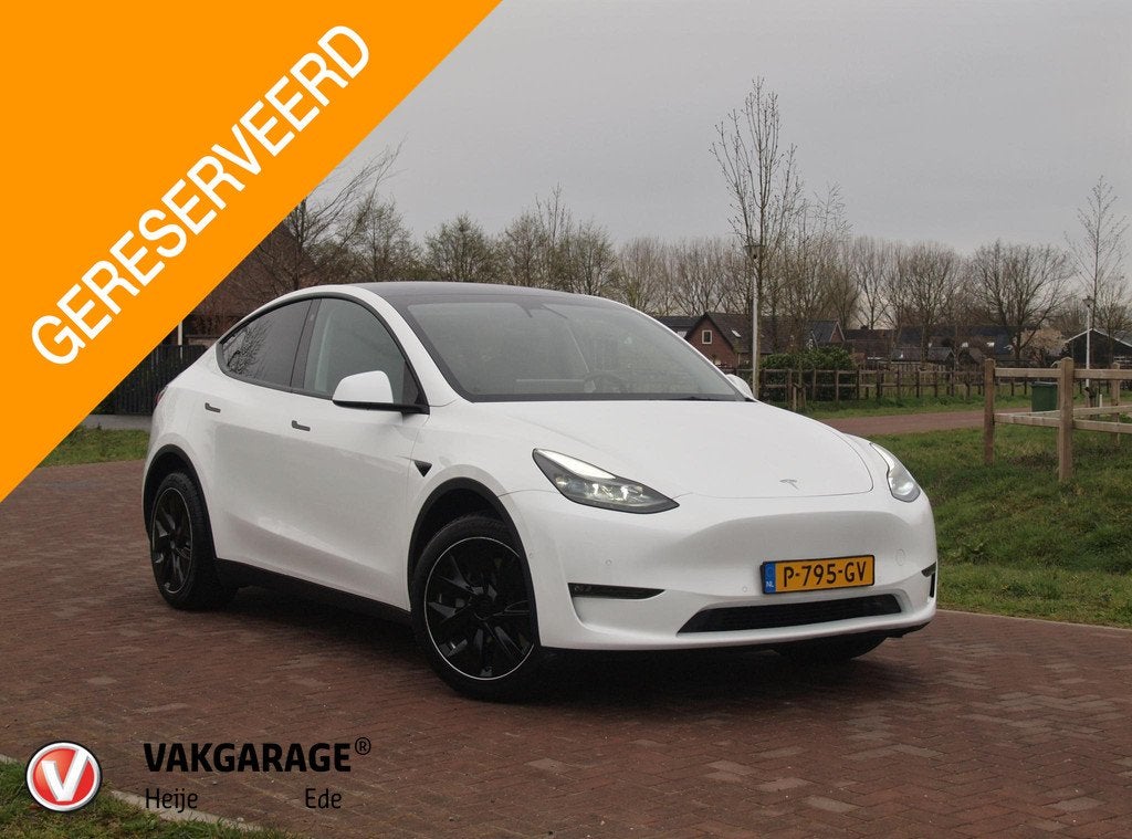 Tesla Model Y Long Range AWD 75 kWh NL-Auto | Panoramadak |, Auto's, Tesla, Automaat, Stof, Gebruikt, 495 min