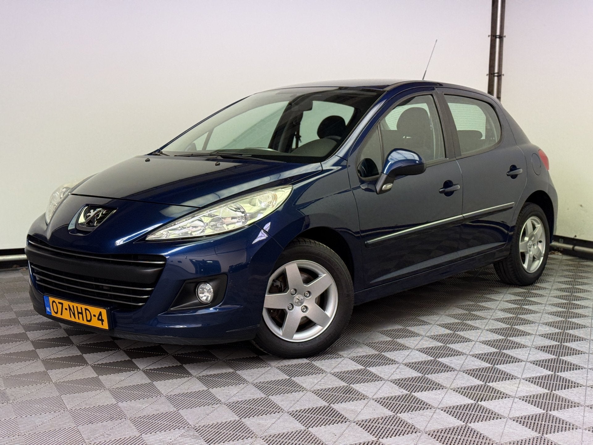 Peugeot 207 1.4 VTi Style 5-drs Airco LM15" NL Auto, Auto's, Voorwielaandrijving, Euro 5, Stof, Gebruikt