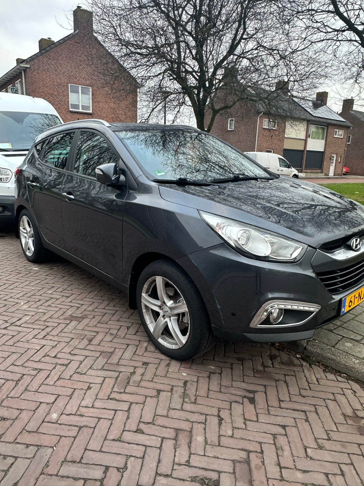 Hyundai iX35 2.0i Cvvt 163pk Aut. 2010 Grijs, Auto's, 1998 cc, 4 cilinders, 163 pk, Origineel Nederlands