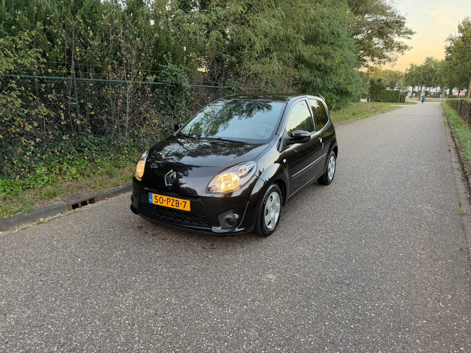 Renault Twingo Collection 1.2 16V 2011 Zwart, Auto's, 839 kg, 74 pk, 4 cilinders, 4 stoelen