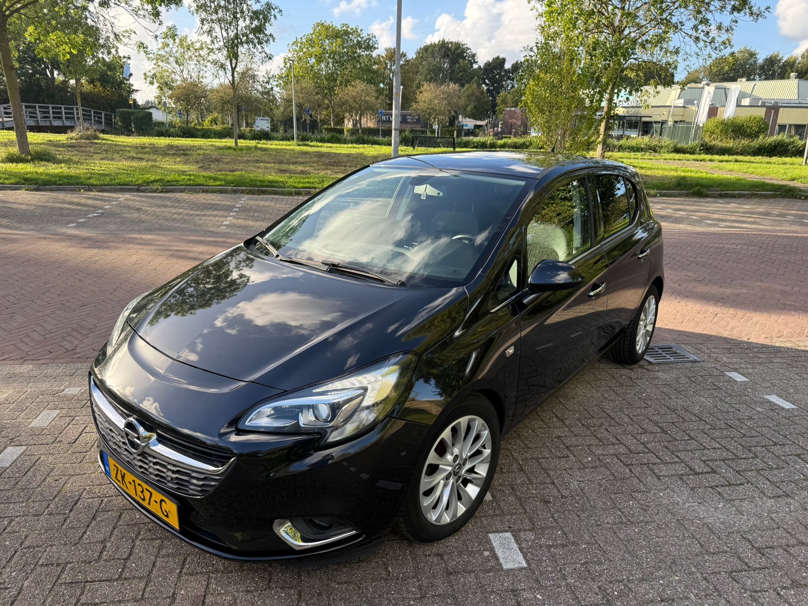 Opel Corsa 1.4 66KW/90PK 5D Easytronic 2015 Zwart, Auto's, 4 cilinders, Leder en Stof, 550 kg, Corsa