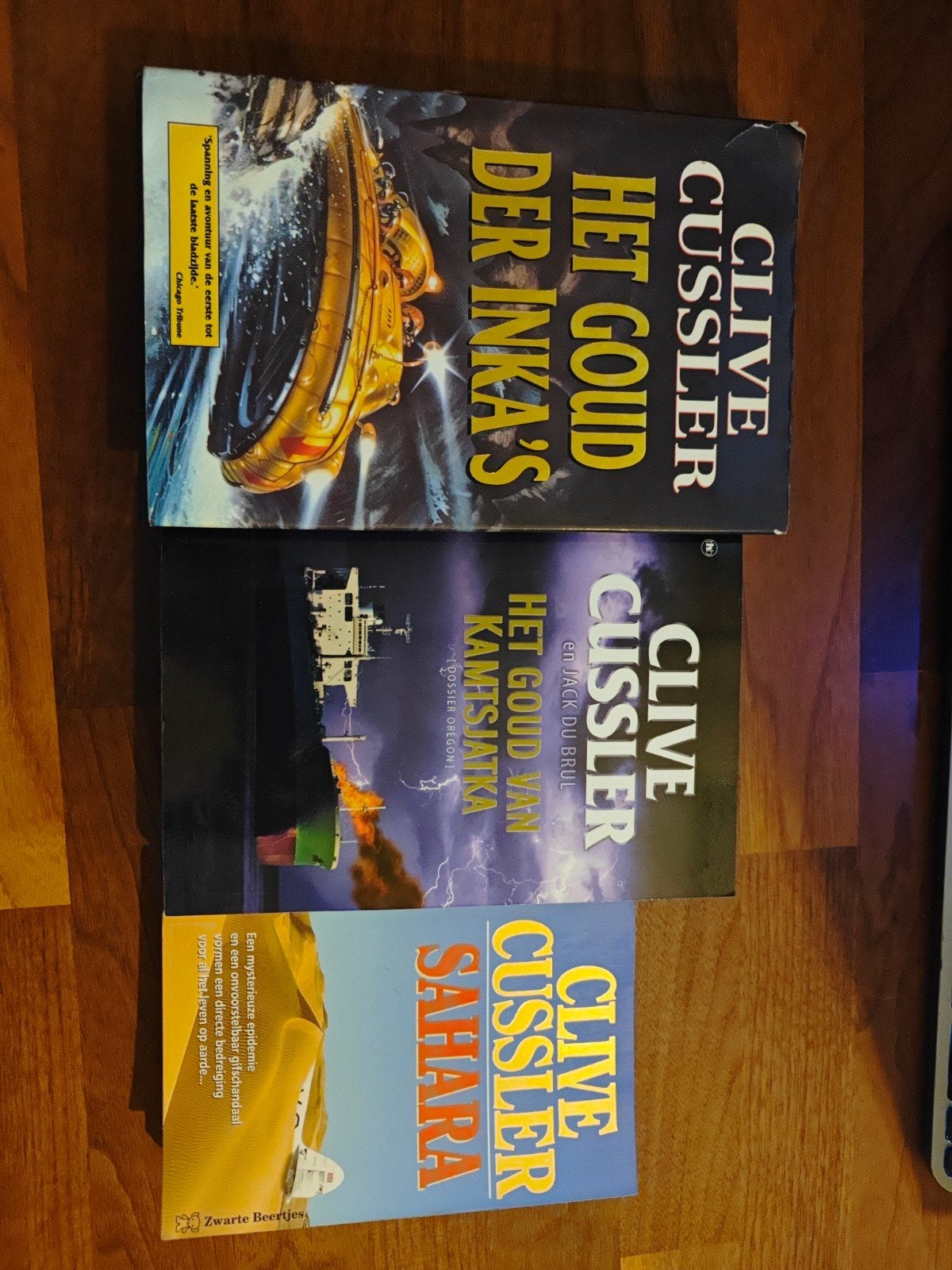 Clive Cussler: Het Goud der Inka's, Kamtsjatka, Saharaara, Ophalen of Verzenden, Gelezen, Clive Cussler, Nederland